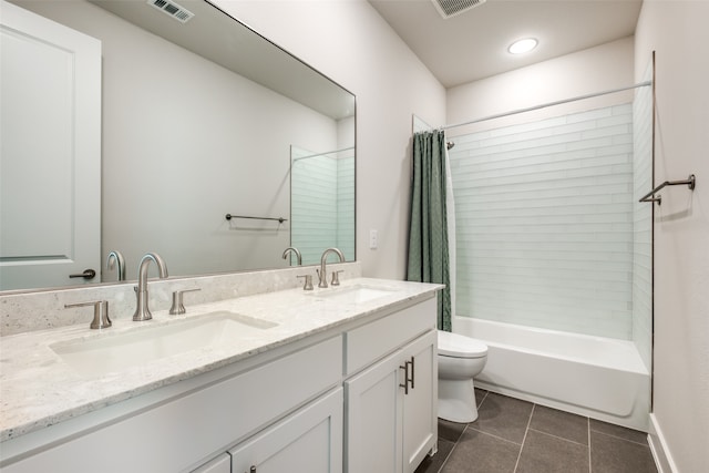 full bathroom featuring tile patterned flooring, vanity, toilet, and shower / bathtub combination with curtain