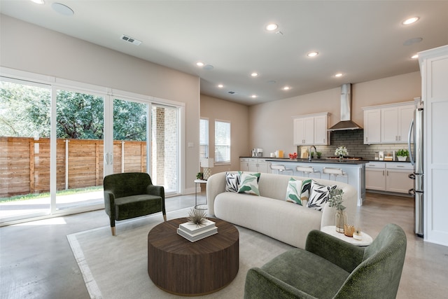 living room featuring sink