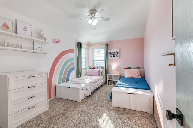 bedroom featuring ceiling fan and light colored carpet