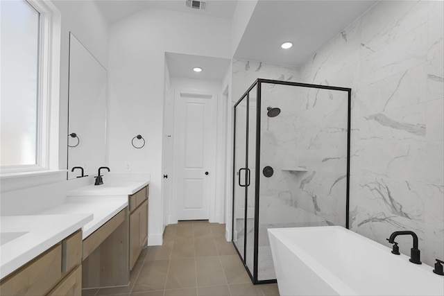 full bathroom with a stall shower, visible vents, a soaking tub, vanity, and recessed lighting