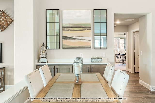 dining space featuring hardwood / wood-style flooring