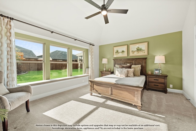 carpeted bedroom featuring ceiling fan, lofted ceiling, and a mountain view