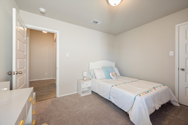 bedroom featuring hardwood / wood-style flooring