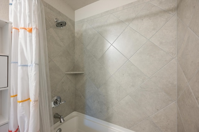 bathroom with shower / bathtub combination with curtain