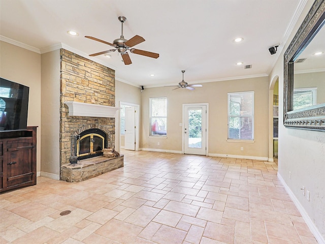 unfurnished living room featuring a fireplace, ceiling fan, and crown molding