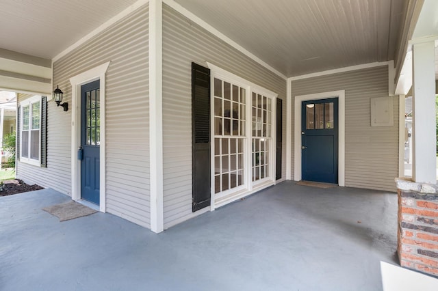 doorway to property featuring a porch