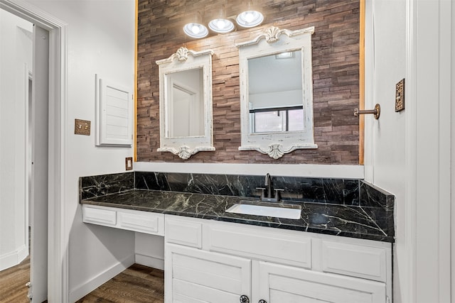 bathroom featuring vanity and hardwood / wood-style floors