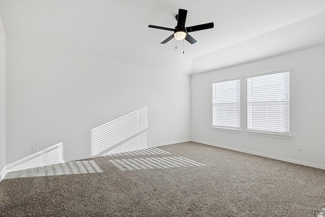 empty room featuring ceiling fan and carpet flooring