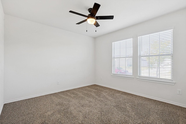 11120 W Pond Dr, Providence Village, TX 76227 - carpeted empty room with baseboards and a ceiling fan