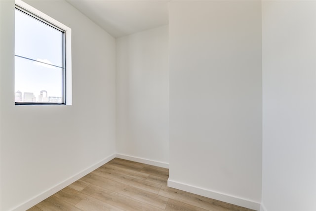 spare room featuring light hardwood / wood-style flooring