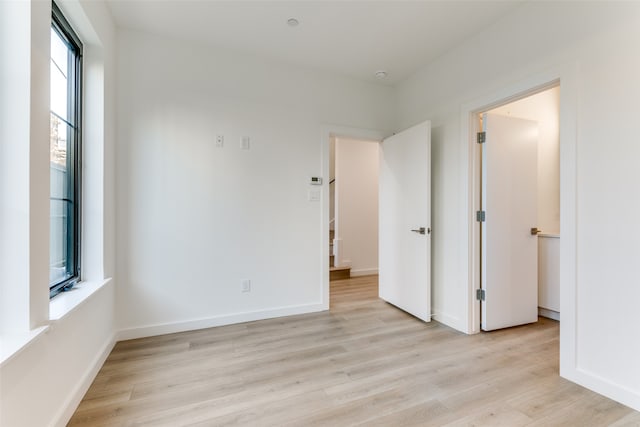 unfurnished room featuring light hardwood / wood-style flooring