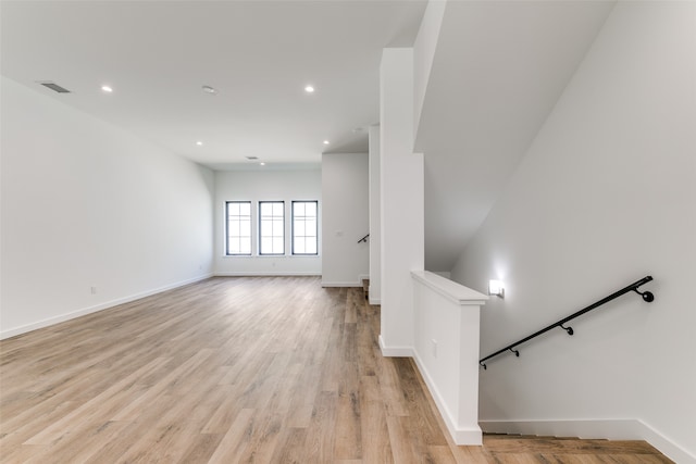 unfurnished living room featuring light hardwood / wood-style floors