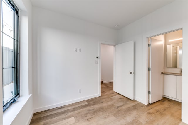 unfurnished bedroom featuring light hardwood / wood-style floors