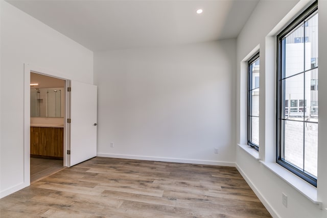 unfurnished room featuring light hardwood / wood-style flooring