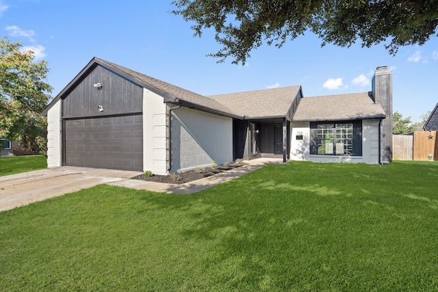 single story home featuring a front lawn and a garage