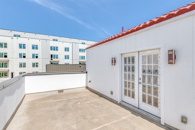 balcony featuring french doors