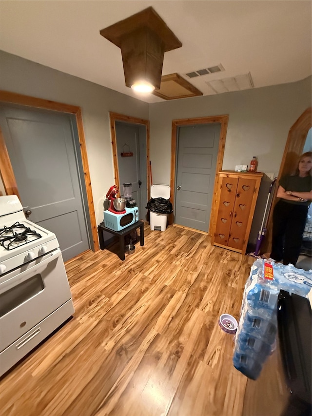 bedroom with light wood-type flooring