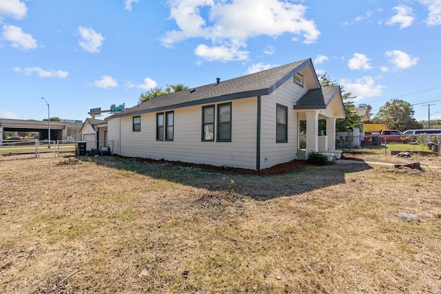 view of home's exterior featuring a yard