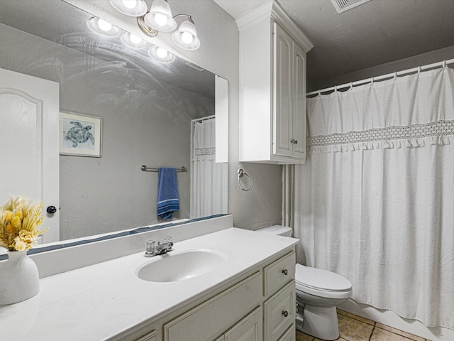 bathroom with a textured ceiling, a shower with shower curtain, toilet, tile patterned floors, and vanity