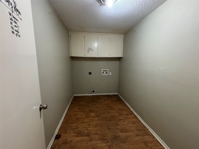 laundry area featuring hookup for an electric dryer, hookup for a washing machine, a textured ceiling, and dark hardwood / wood-style flooring