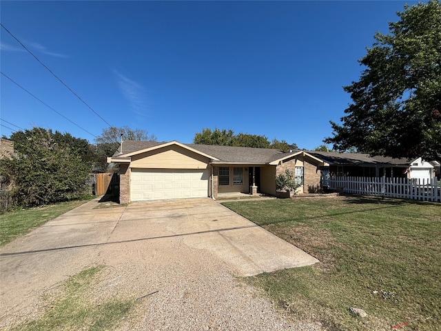 ranch-style house with a front yard and a garage