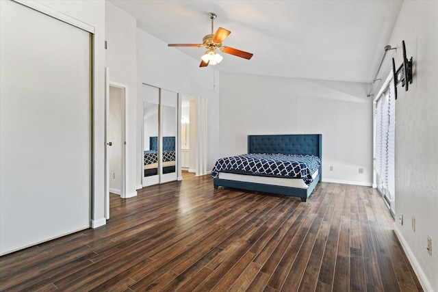 bedroom with dark hardwood / wood-style flooring, a closet, and ceiling fan