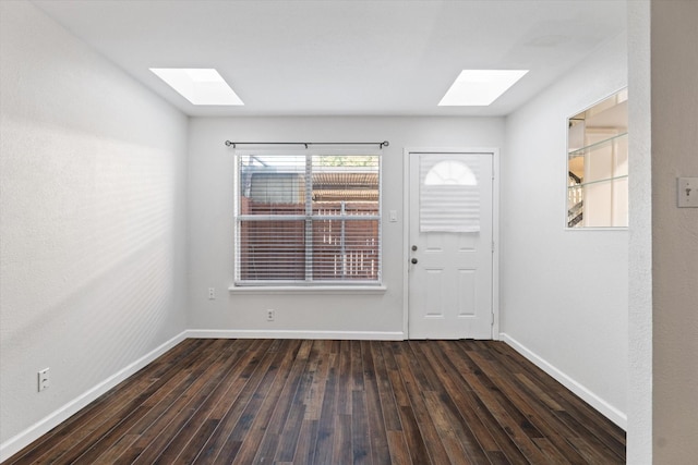 entrance foyer with dark hardwood / wood-style floors