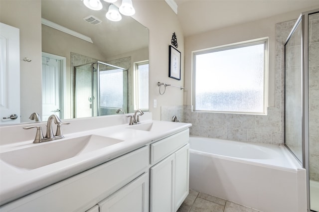 bathroom with separate shower and tub, vaulted ceiling, ornamental molding, vanity, and tile patterned flooring