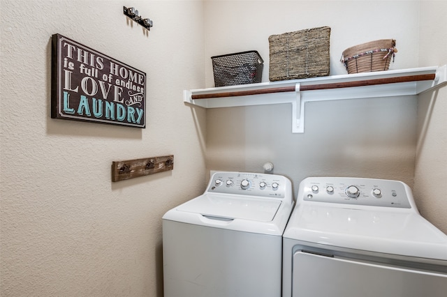 clothes washing area featuring washing machine and clothes dryer