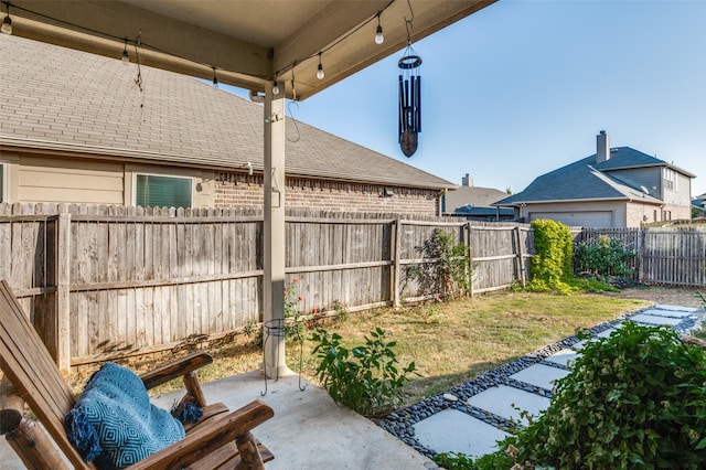 view of yard with a patio area