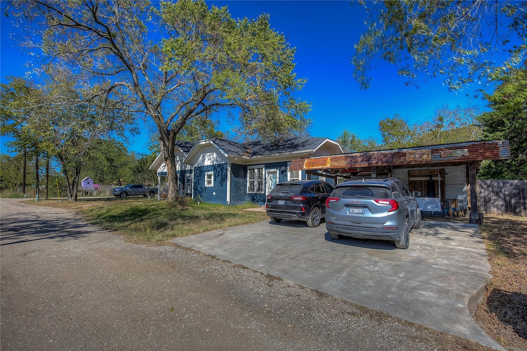 view of front of house with a carport