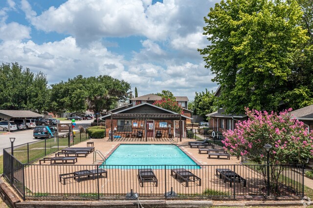 view of pool featuring a patio