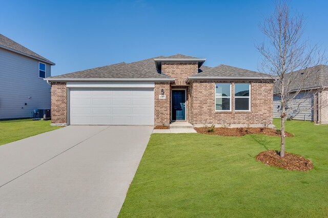 property in mid-construction featuring an outbuilding and a garage