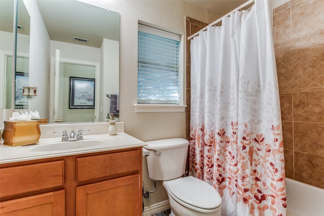 full bathroom featuring vanity, toilet, and shower / bathtub combination with curtain