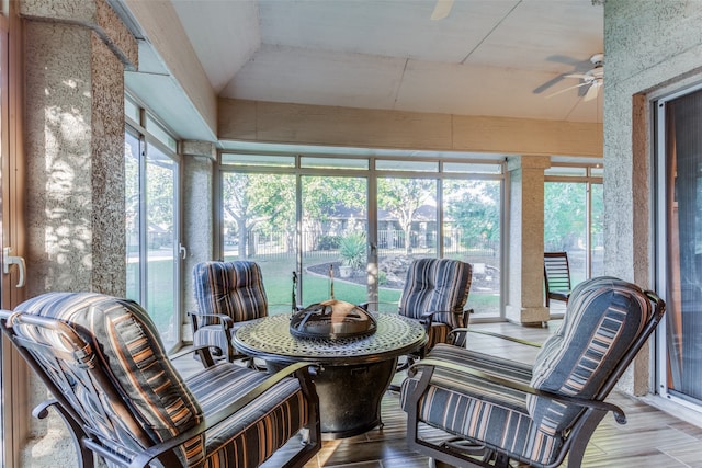 sunroom / solarium with ceiling fan