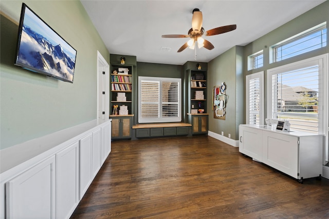 office with ceiling fan and dark hardwood / wood-style flooring