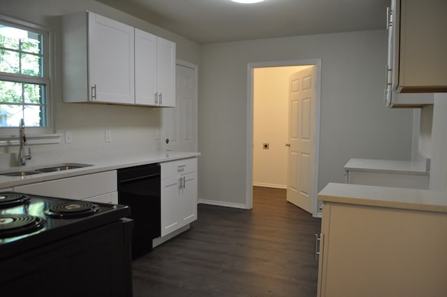 kitchen featuring black dishwasher, sink, white cabinets, dark wood-type flooring, and white electric range