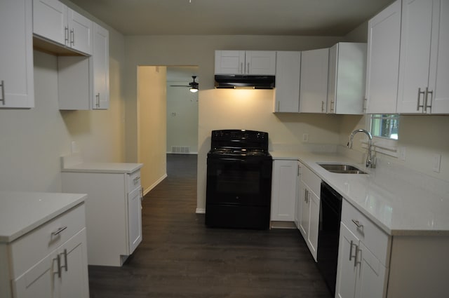 kitchen with white cabinetry, black appliances, and sink