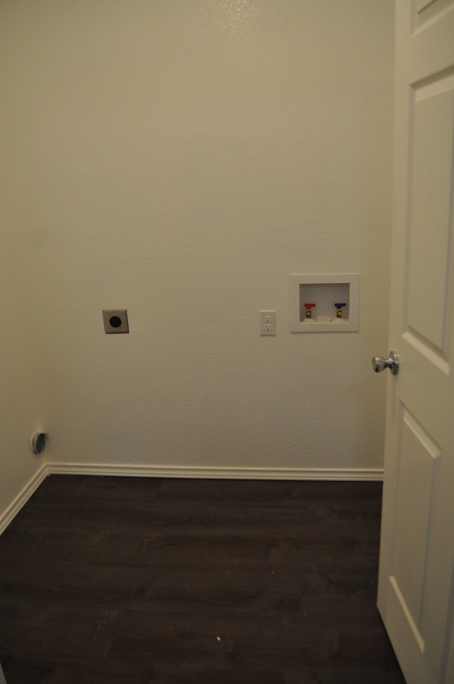 laundry area featuring hookup for an electric dryer, dark hardwood / wood-style floors, and washer hookup