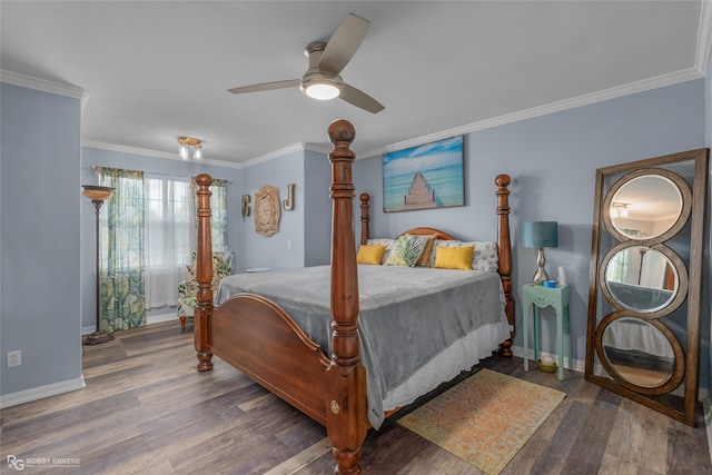 bedroom featuring dark wood-type flooring, ceiling fan, and ornamental molding