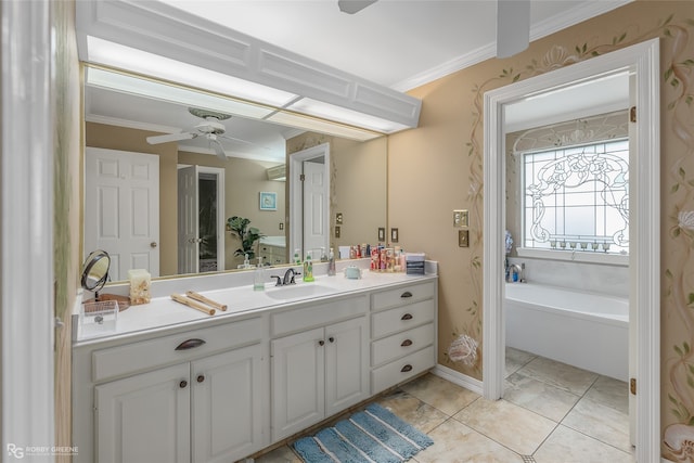 bathroom featuring a tub, tile patterned flooring, ornamental molding, vanity, and ceiling fan