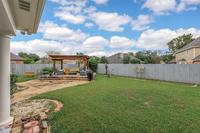 view of yard featuring a pergola and a patio area