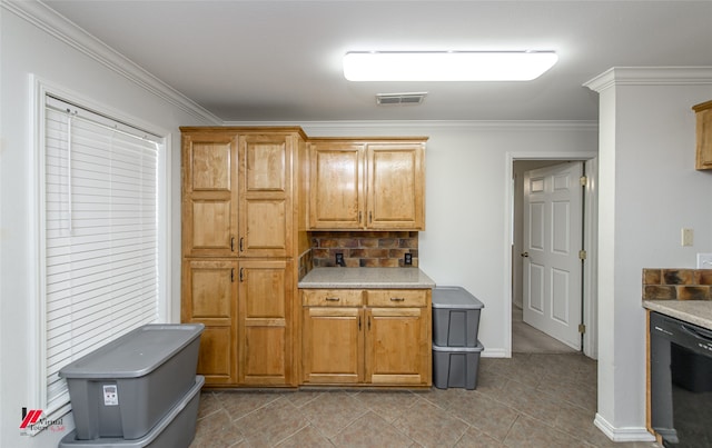 kitchen featuring decorative backsplash, ornamental molding, black dishwasher, and light tile patterned floors