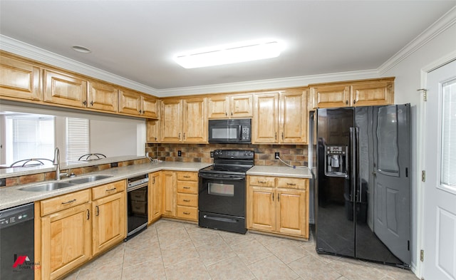 kitchen featuring sink, black appliances, crown molding, light tile patterned floors, and tasteful backsplash