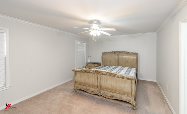 bedroom featuring ceiling fan, crown molding, and light colored carpet