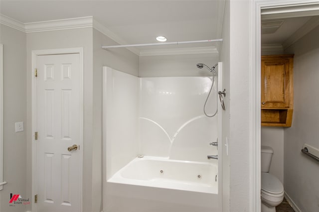 bathroom featuring toilet, crown molding, and shower / tub combination