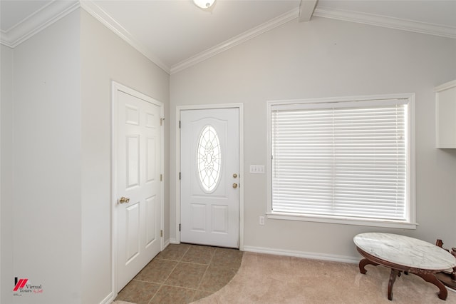 carpeted foyer featuring vaulted ceiling with beams and ornamental molding