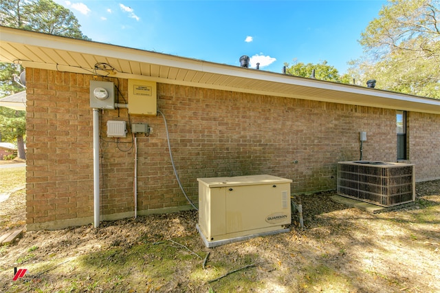 exterior details with central AC and a wood stove