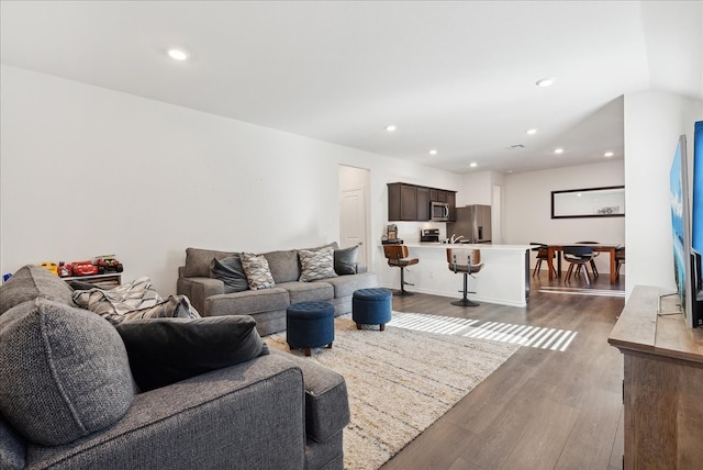 living room with light hardwood / wood-style floors