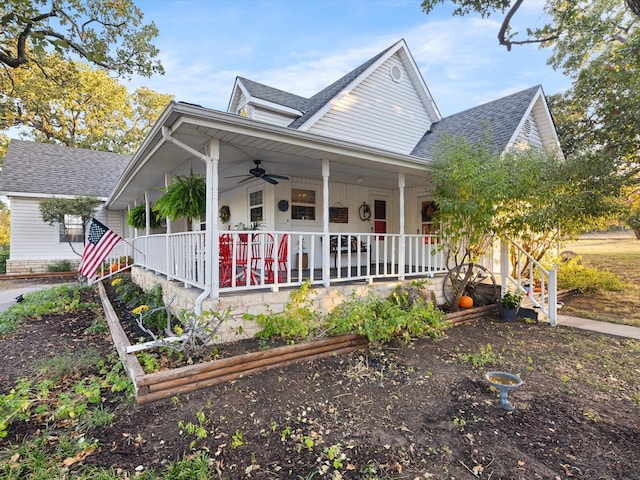 view of front of house featuring ceiling fan and covered porch